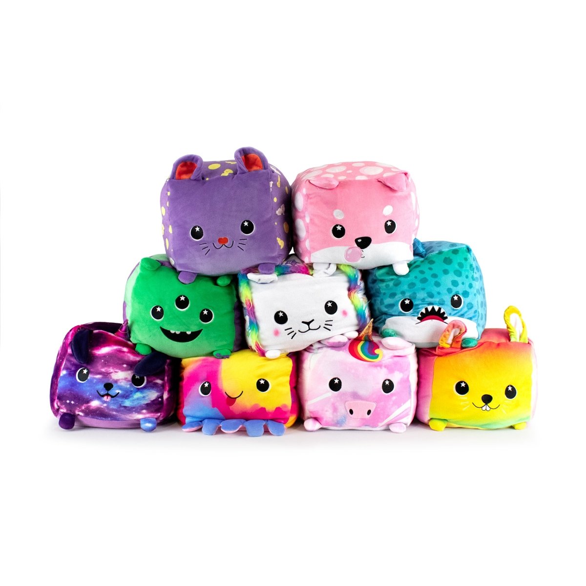 Nine plush cube-shaped toys, including Cheddar the Mouse Plushie, are stacked in a pyramid. Each toy features unique designs of animals and fantasy creatures with vibrant patterns.