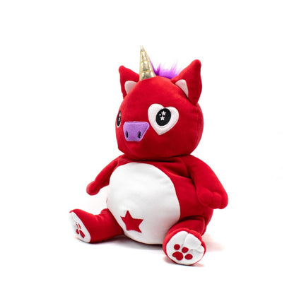 Alma the Unicorn Starlight Buddy Plushie is an adorable stuffed animal featuring a chubby unicorn with a red body, white belly, and purple hair. It has a gold horn, heart-shaped eyes, and a star on its belly, sitting upright against a white background.