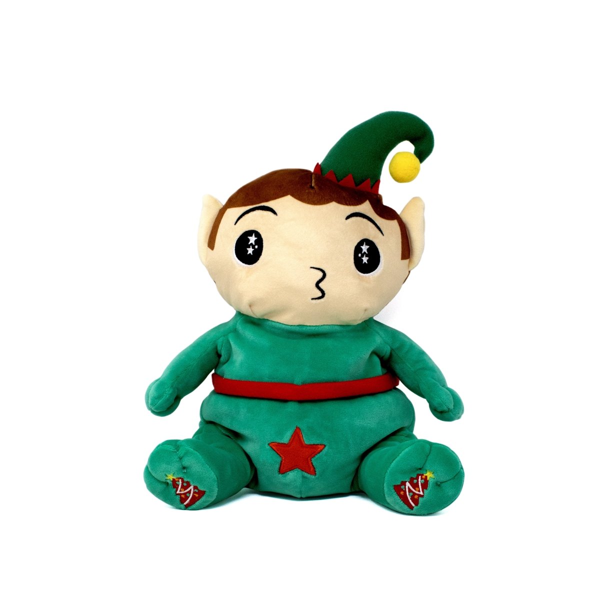 Jingle the Elf Starlight Buddy is a plush toy with large black eyes, pointy ears, a green outfit featuring a red star on the belly, and a green hat topped with a yellow pom-pom, shown sitting upright against a white background.