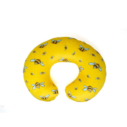 The Vee the Bee 2-In-1 Travel Pillow is a cute yellow U-shaped neck pillow with a bee pattern, featuring large bees with blue wings and smiling faces for comfort and support while traveling.