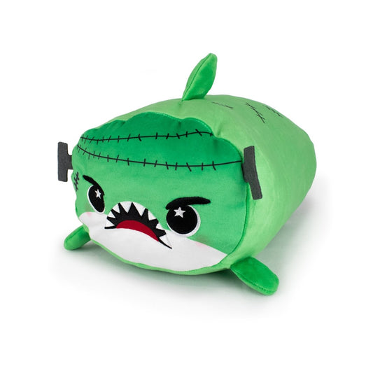 Vic the Monster Shark is a green shark plushie with cartoonish angry eyes, a jagged mouth, bolts on each side, black stitches on its head, and small fins—Frankenstein-inspired and perfect for any unique stuffed animal collection.