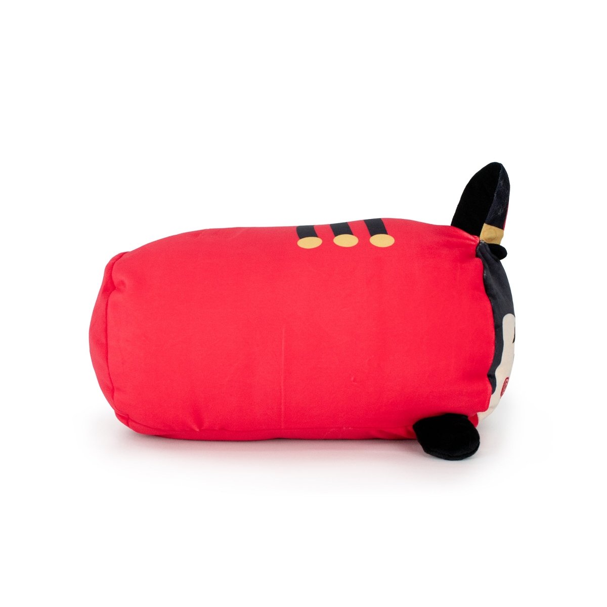 Voski the Nutcracker is a plush pillow shaped like a red cylinder with black and yellow cat ears, a tail, and simple cat face details. Soft, cuddly, and machine washable—perfect for fans of plush toys.