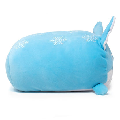 Yuki the Snow Fox Plushie is an adorable blue plush toy resembling a round animal with small ears and a tail, adorned with white snowflake patterns and lying on its side, highlighting its charming features.