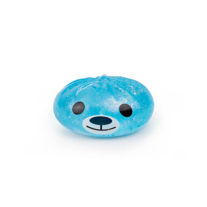 A blue, round, squishy Bubblegum’s Favorite Toy - Holiday Mystery Maltose Dumpling shaped like a bear face.