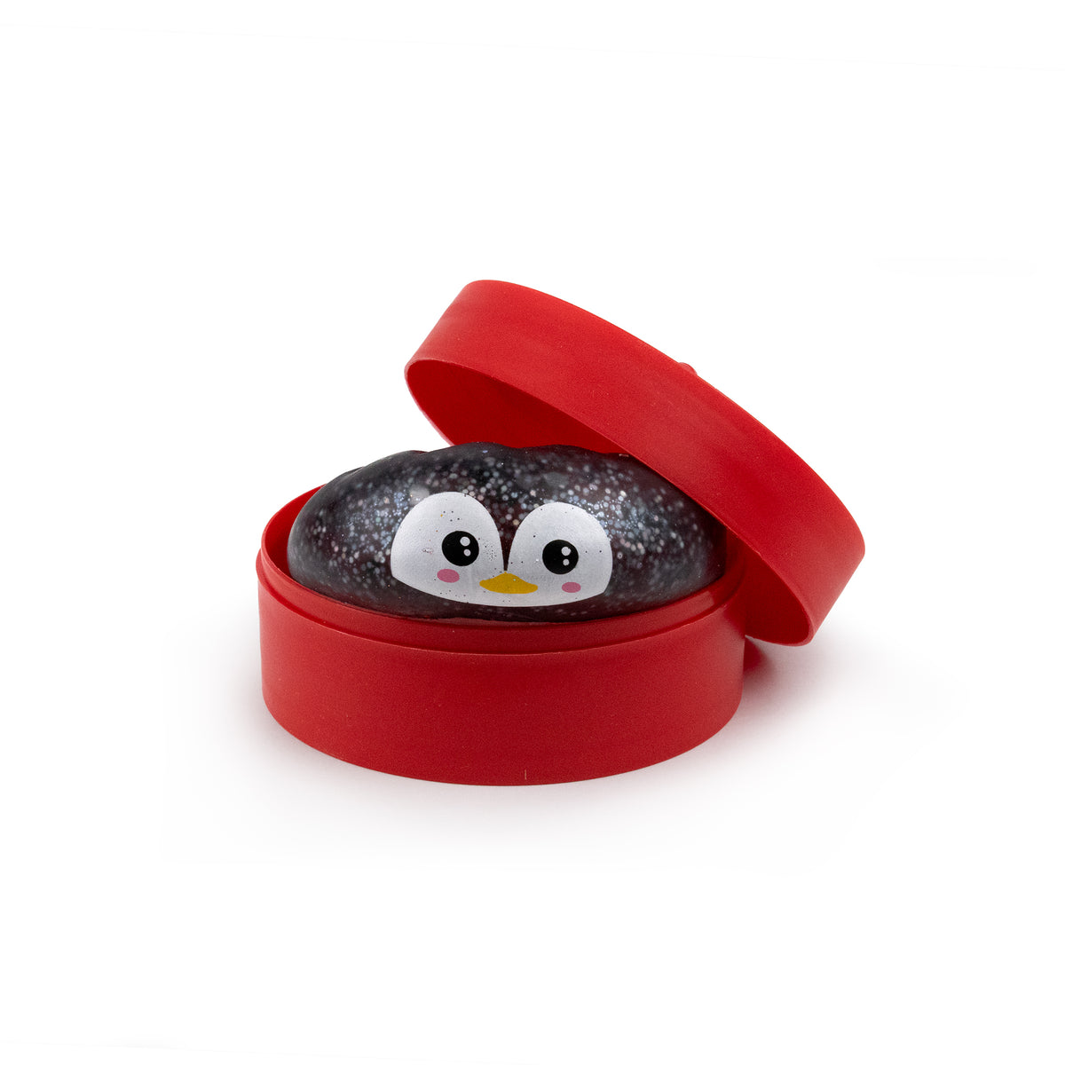 A dark, glittery, penguin-shaped Holiday Mystery Maltose Dumpling sits inside a round, red plastic container with its lid tilted open.