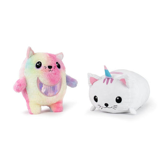 The Daisy and Cat Monstah Pair includes a standing pastel rainbow plushie with a big smile and small ears, plus a soft white cat-like toy with a blue unicorn horn and pink stripes, lying on its belly.
