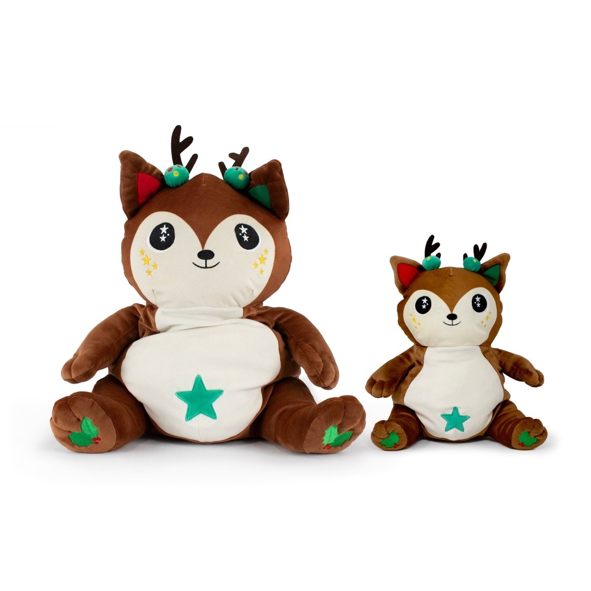 Two plush toys resembling cute reindeer feature brown fur, antler-like adornments, star symbols on their bellies, and green ear accents. Named Mitzy the Reindeer Starlight Buddy, one is larger than the other, creating a charming parent-child look.