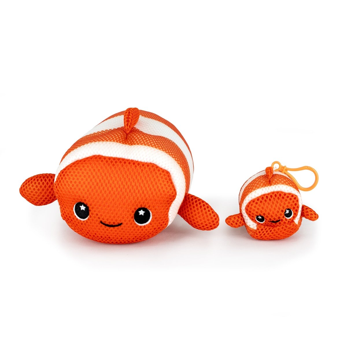 Two Aqua Moosh-Moosh Finster plush clownfish toys—one large, one small—both orange with white stripes, smiling faces, and black eyes with star highlights. The smaller toy features an attached clip.
