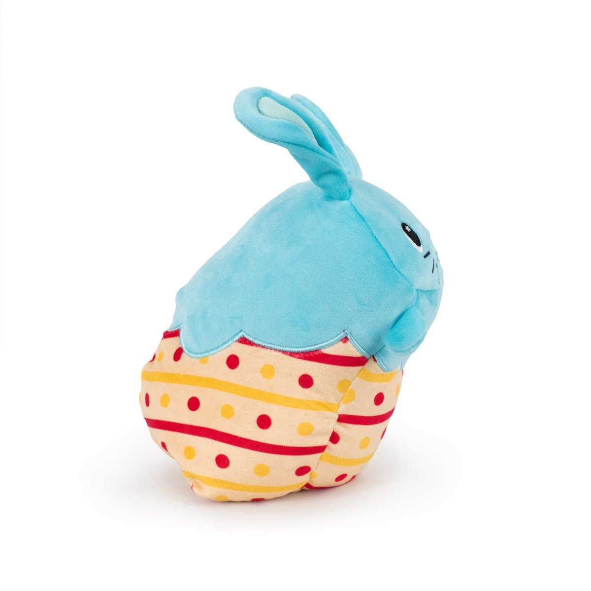 Bitty the Bunny Hatchling is a blue rabbit-headed plush from the Plush Buddies Collection, featuring a red, yellow, and cream-striped body with polka dots. Crafted from ultra-soft materials, it's ideal for cuddles and adds a vibrant touch to any room.