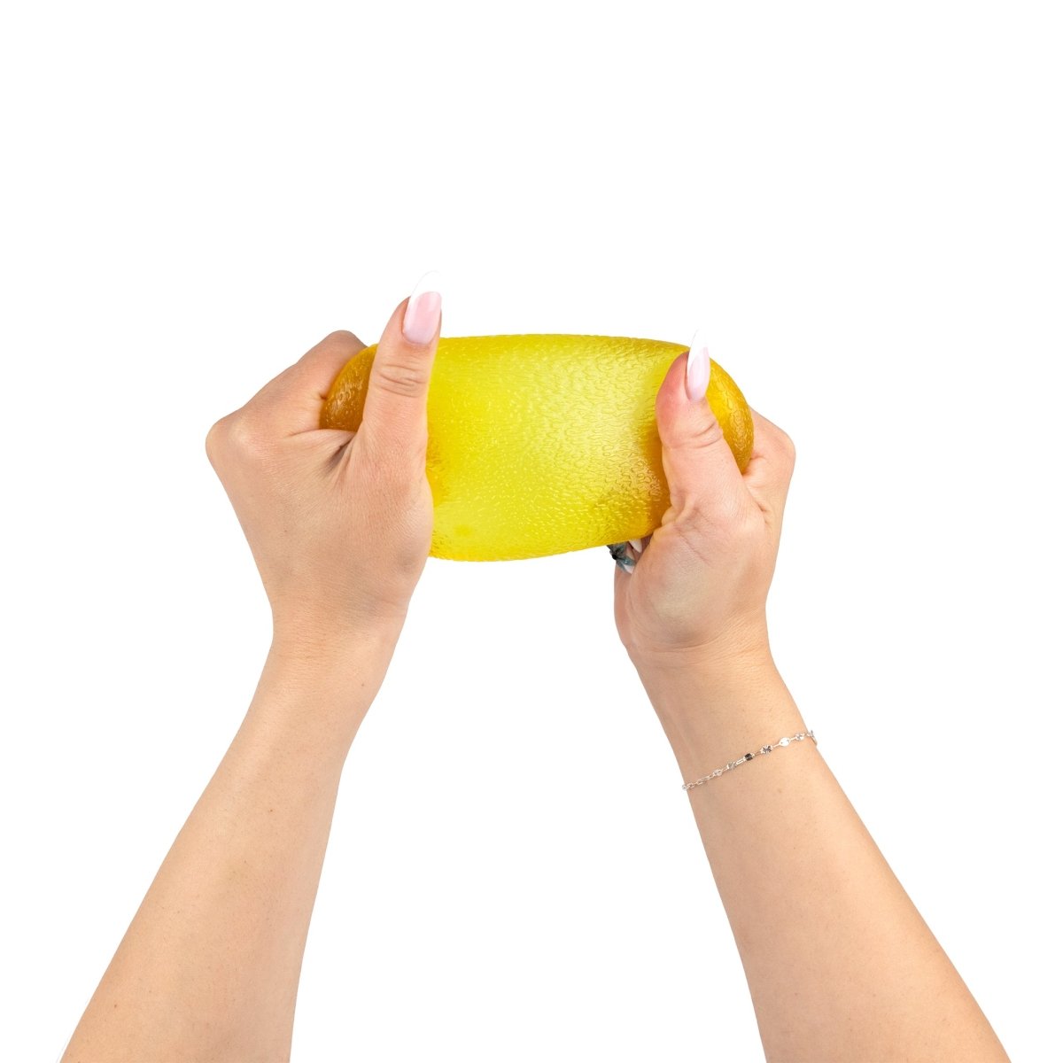 Two hands with manicured nails stretch a yellow, textured Sugah-mals Gumdrops sensory stress relief toy by Bubblegum's Favorite Toy against a white background.