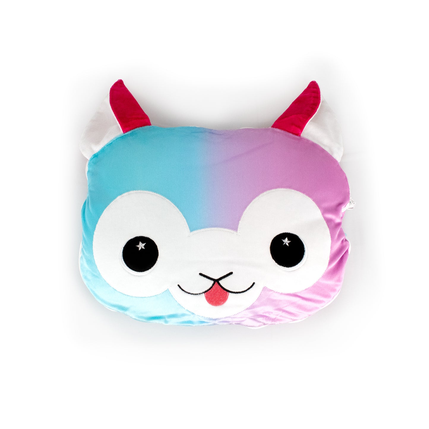 The 2-in-1 Pillow Blanket - Comet the Alpaca features a plush cartoon alpaca face in blue and pink, with large round eyes, a small smiling mouth with its tongue out, and two pink-and-white ears.