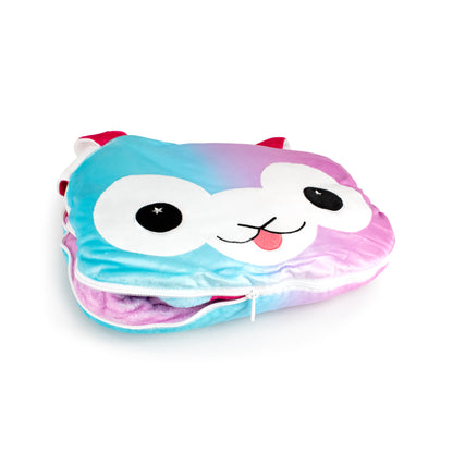 The 2-in-1 Pillow Blanket - Comet the Alpaca features a cute animal face with big eyes, small nose, pink tongue, gradient blue and pink alpaca design, little ears, and a partially unzipped pillow for extra charm.