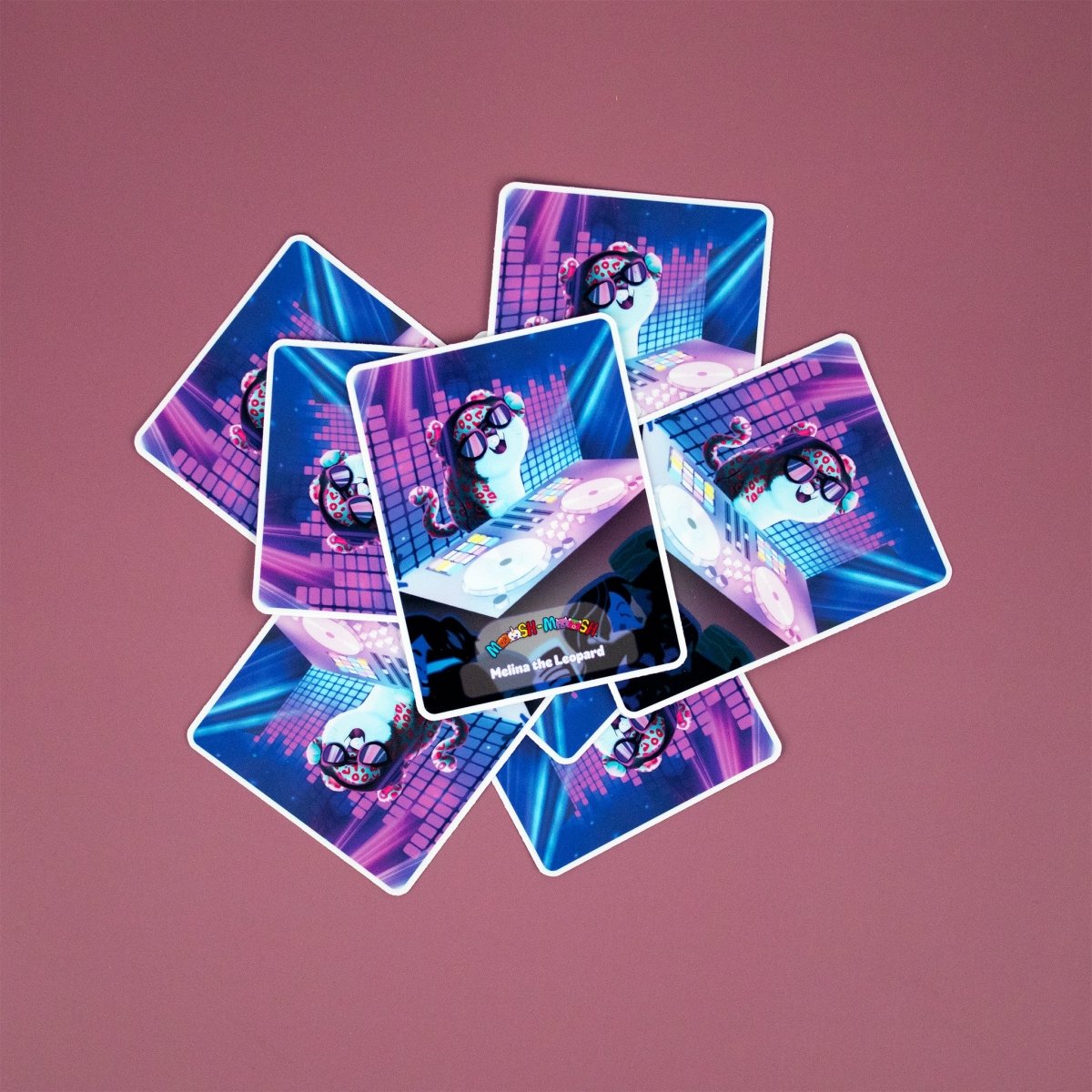 A set of Moosh-Moosh 3" x 4" Vinyl Stickers arranged in a star pattern on a pink surface, each sticker showing a panda DJ with headphones at a neon-lit turntable.