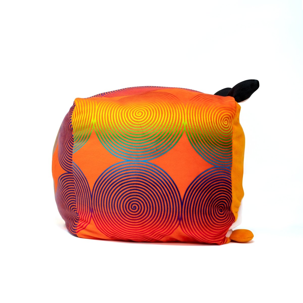 A vibrant plush bean bag featuring overlapping spirals in orange, yellow, and red shades with a small black top handle is named Milo the Fox Plushie.