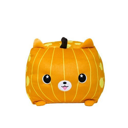 The Pom-Kin the Pomeranian Pumpkin is a cube-shaped plush toy resembling a smiling orange cat with pointy ears and starry eyes, adorned with lighter stripes, paw prints, and a small brown stem on top—irresistibly cute!.
