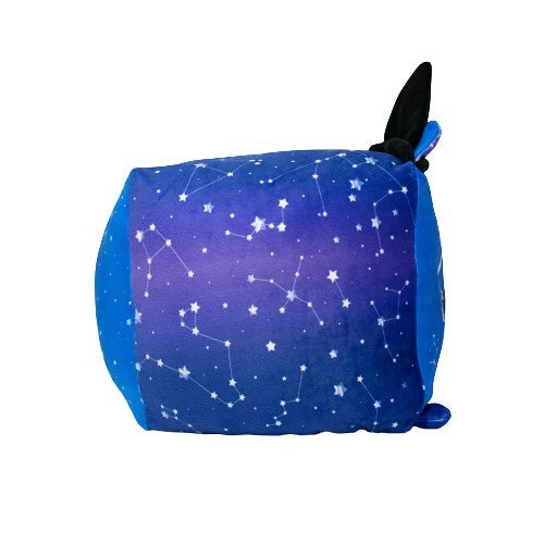 Sabrina the Cat is a snuggly cylinder plush with a blue and purple night sky design, white constellations and stars, plus black ears on top—perfect for magical cat lovers.