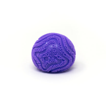 A vibrant purple Maltose Vibe Ball from Bubblegum’s Favorite Toy, featuring textured geometric patterns, rests on a clean white background.
