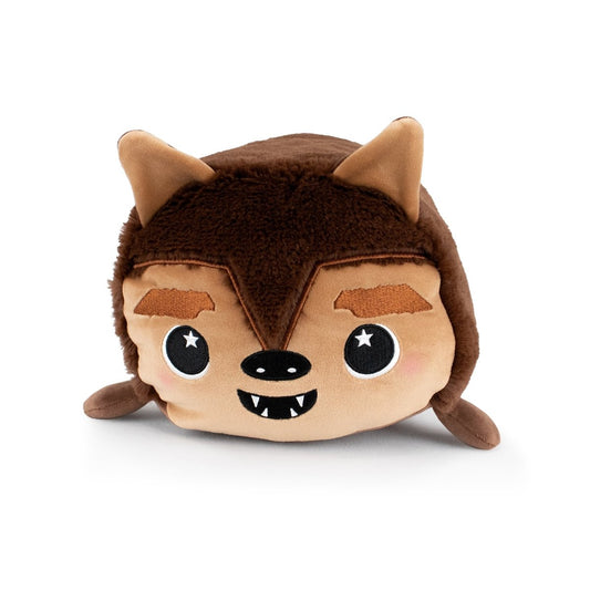 Raegan the Werewolf is a cute plush toy with pointy ears, brown fur, embroidered starry eyes, a toothy smile, and small paws—perfect for cuddly toy fans and plushie collectors. Shown against a white background.