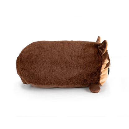 A soft plush toy named Raegan the Werewolf, shaped like a brown rectangular animal with small ears, a round nose, and large eyes, lies on its side against a white background—perfect for stuffed plushie fans.