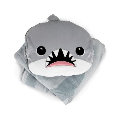 A folded light gray 2-in-1 Pillow Blanket - Crush the Shark with a soft, plush shark-shaped pillow featuring big eyes, a pink mouth, and white teeth on top.