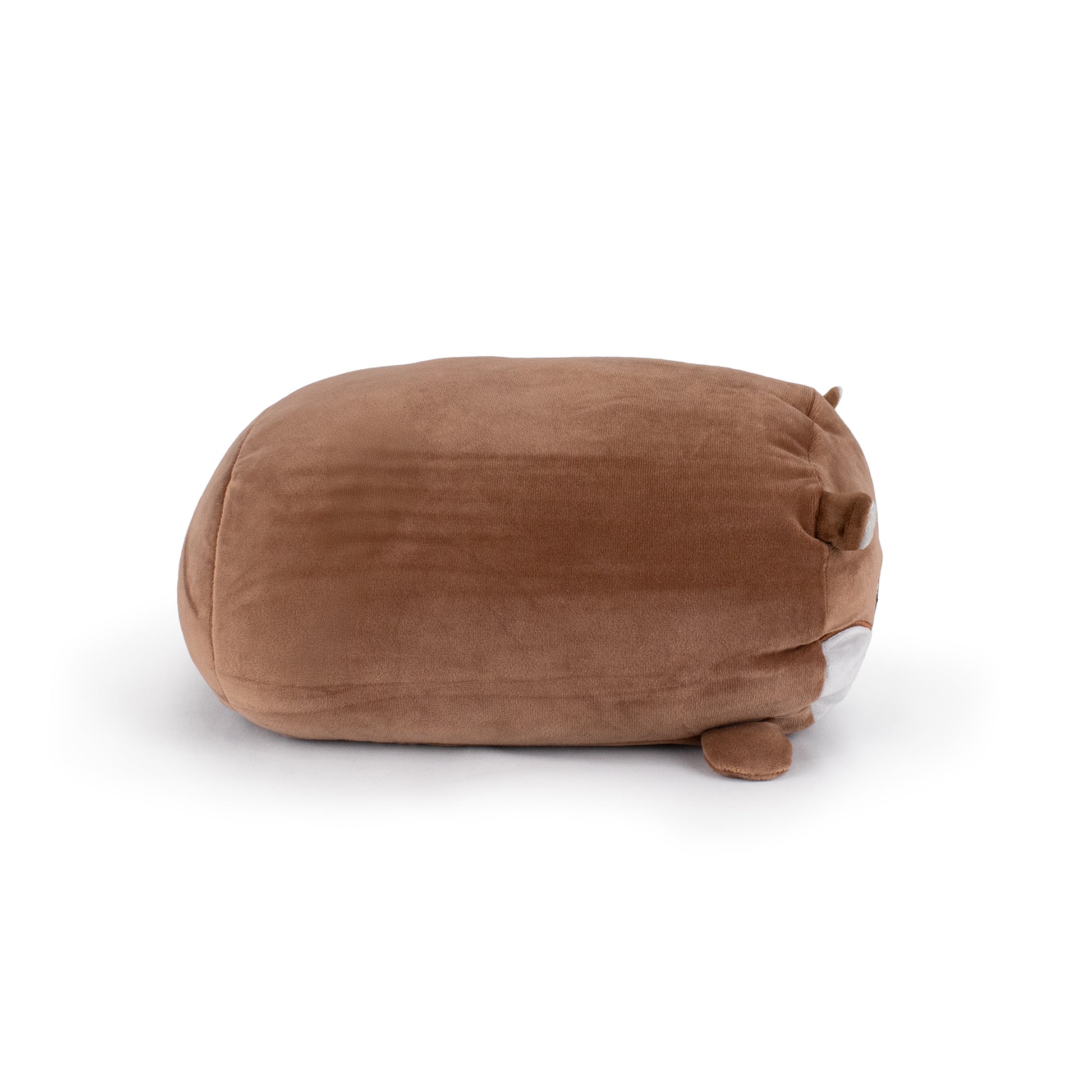 Slick the Otter is a plush toy shaped like a chubby brown otter, lying on its side with small ears, a tiny tail, and barely visible legs against a plain white background.